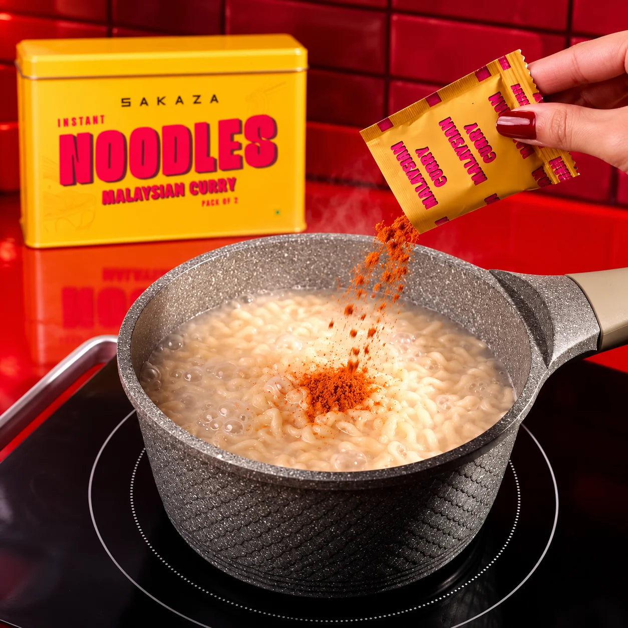 Malaysian curry masala being added to cooking noodles